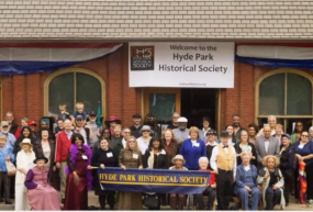 A group in front of the Hyde Park Historical Society